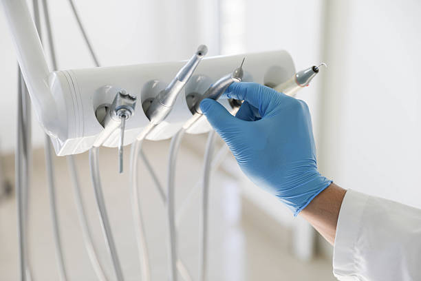 Professional Emergency Dentist technician working in Harrison, NY